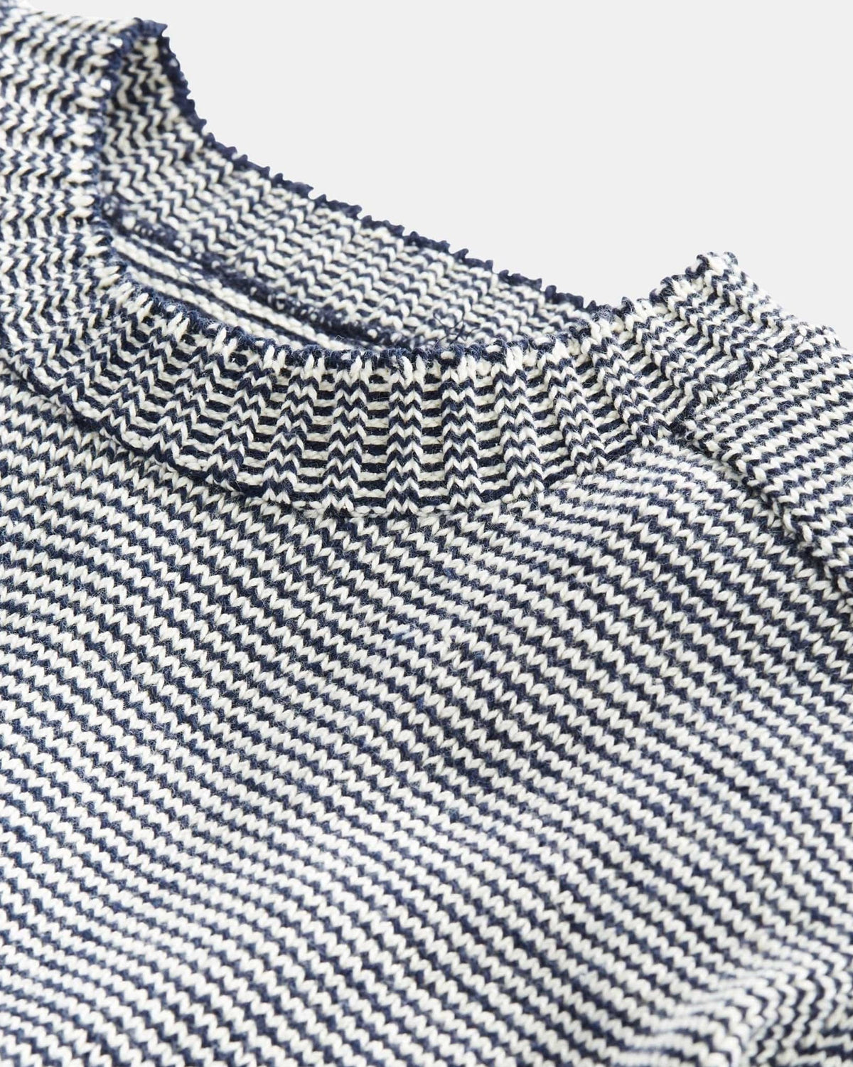 Whalerknits Westport Crewneck Saddle Shoulder Pullover: Close-up of the navy and natural fine-striped neckline and saddle-shoulder construction.