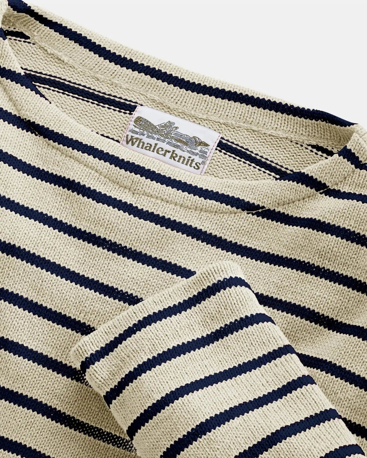 Whalerknits Nantucket Classic Boatneck Sweater: Close-up of the natural and navy striped boat neckline, cuff and label.