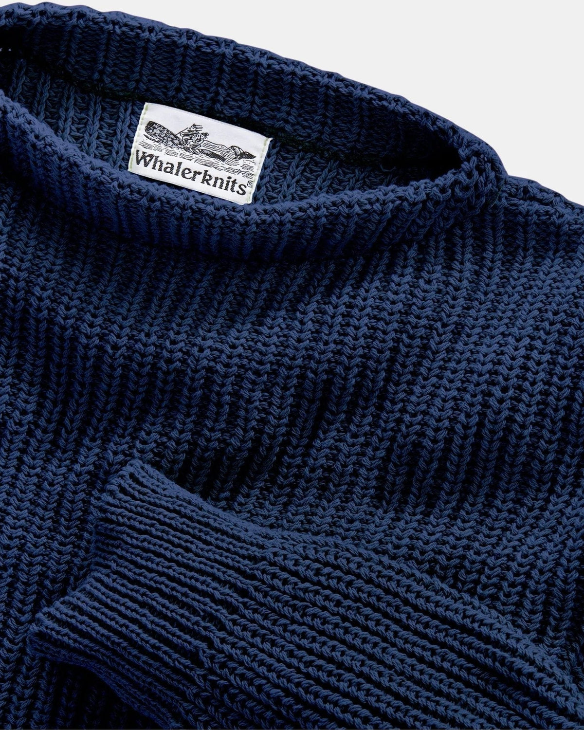 Whalerknits Newport Shaker Boatneck Sweater: Close-up of the navy boat neckline, ribbed cuff and Whalerknits label.