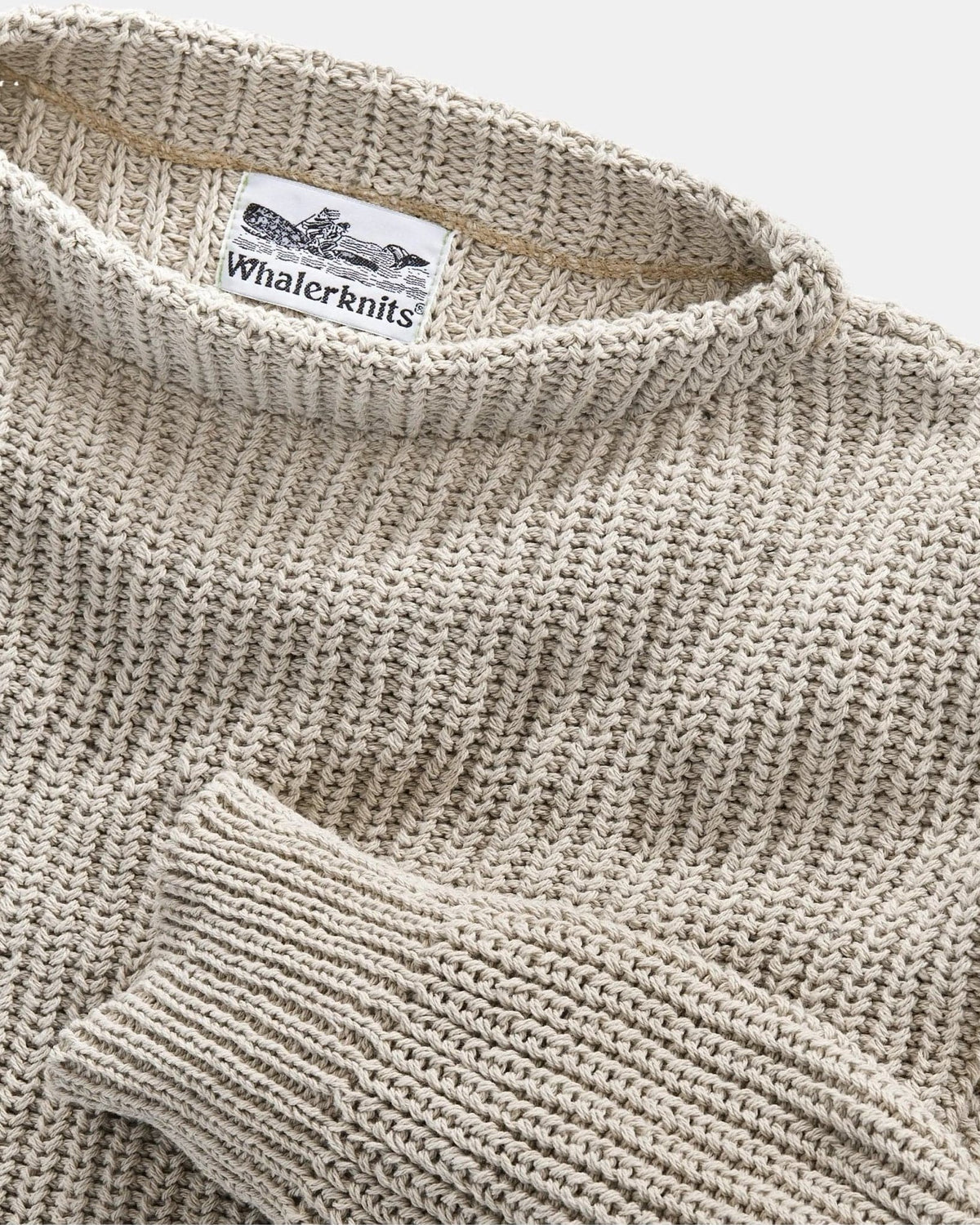 Whalerknits Newport Shaker Boatneck Sweater: Close-up of the taupe neckline, ribbed cuff, knit texture and label.