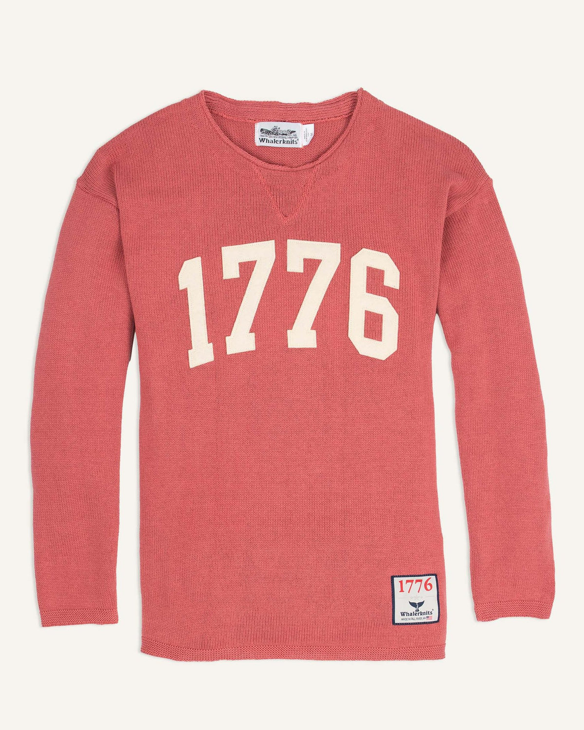 Whalerknits 1776 HOMETOWN Sweater: Nantucket Red sweater laid flat with large natural-colored 1776 numerals and a small hem patch. #Color_Nantucket Red
