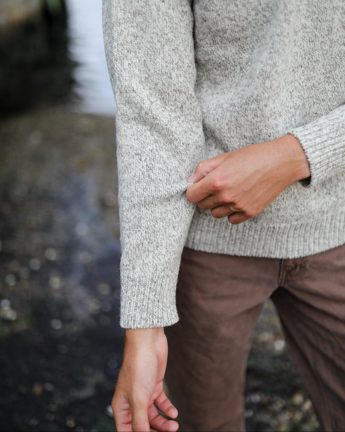 Whalerknits Wellfleet Classic Crewneck Jersey - Wool Blend: Close-up of the sleeve and ribbed cuff while the wearer adjusts the sleeve.
