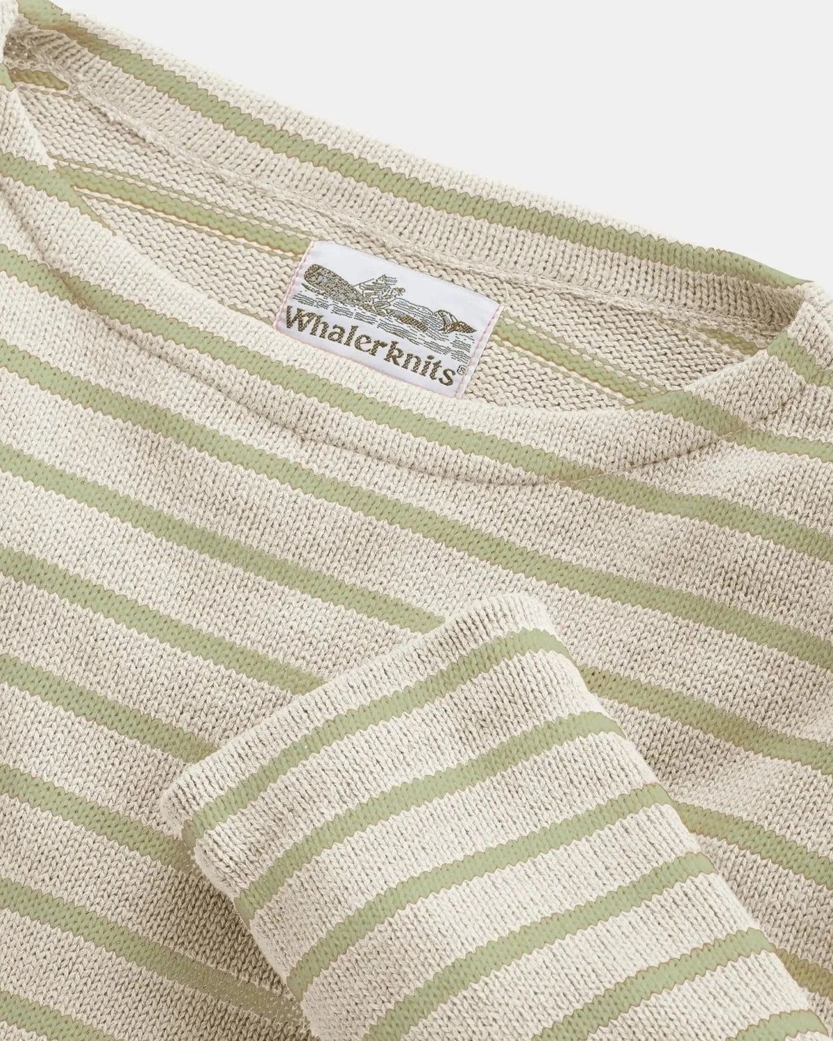 Whalerknits Nantucket Classic Boatneck Sweater: Close-up of the natural and light green striped neckline, cuff and label.