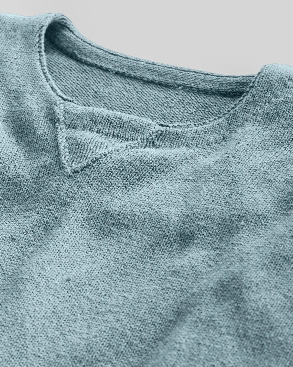 Whalerknits Chatham Jersey Sweatshirt Pullover: Close-up of the blue neckline, triangular insert and jersey-knit texture. #Color_Pacific