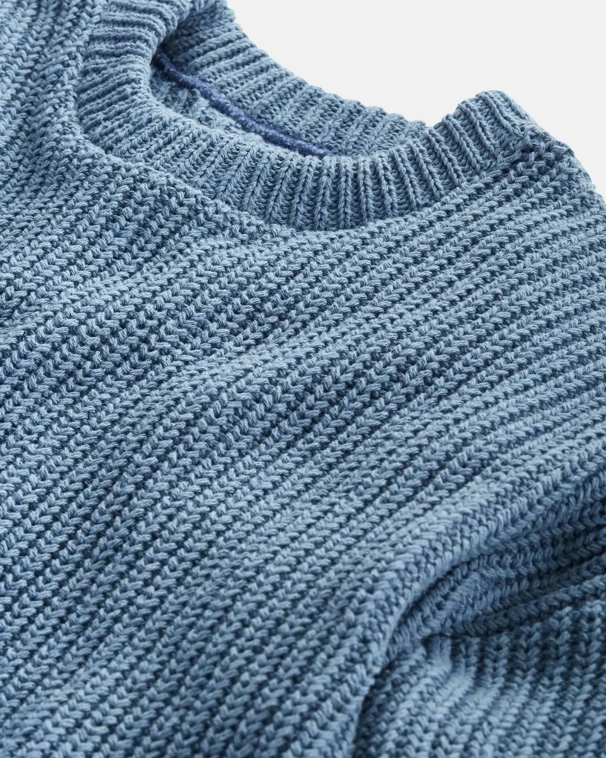 Whalerknits Newport Shaker Knit Crewneck Sweater: Close-up of the blue crew neckline and textured shaker-knit stitches.