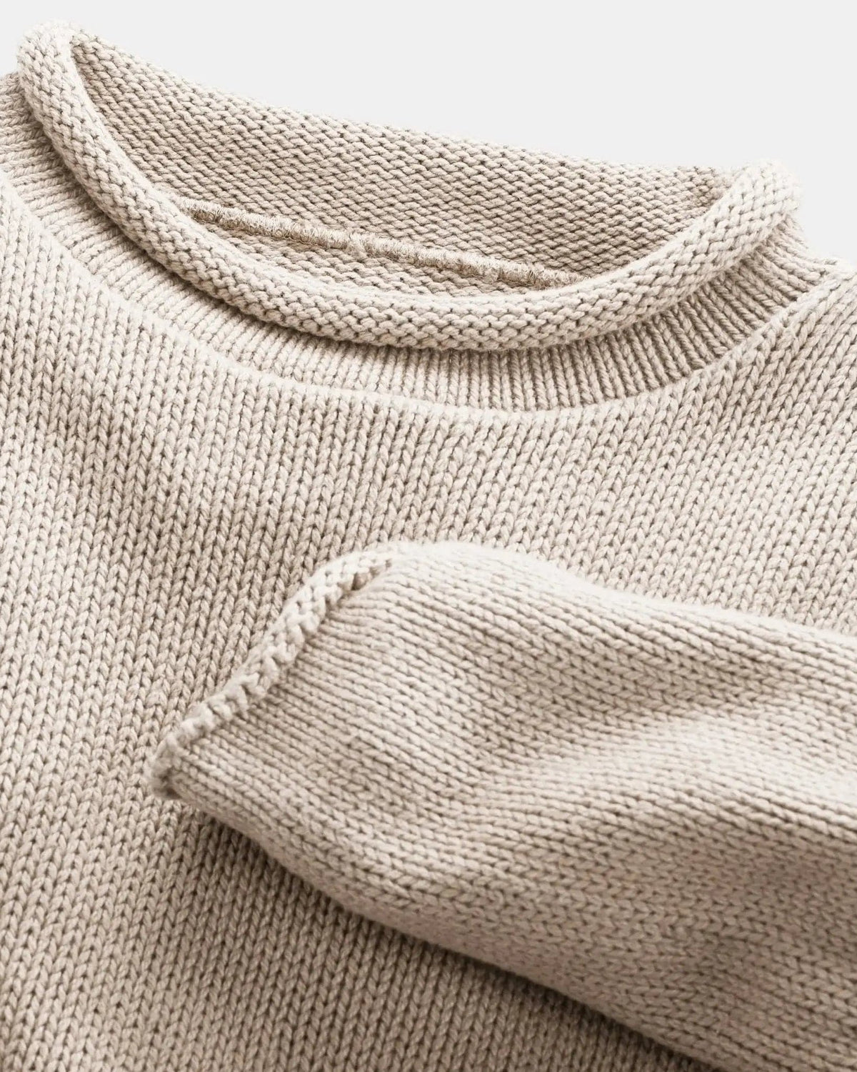 Whalerknits Wellfleet Rollneck Sweater: Close-up of the linen rolled neckline, cuff and knit stitches.